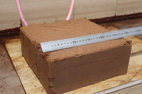 Coco peat grow blocks compressed and ready for planting, providing superior soil aeration and moisture control for healthy plant development